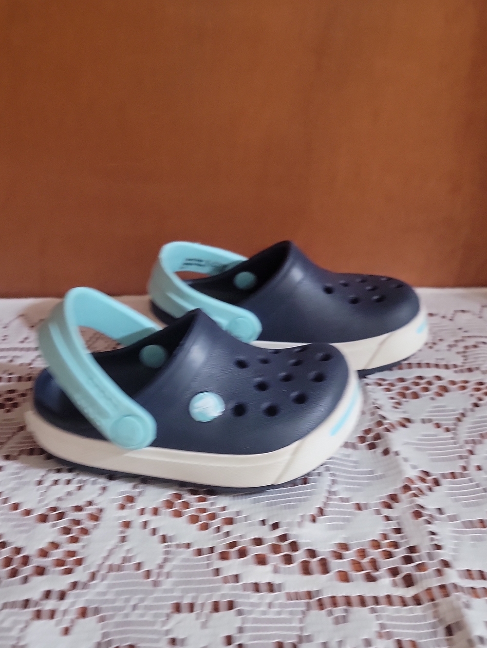 CROCS Kids Navy Clogs with Light Aqua Straps